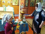 На приходах Верхнемамонского благочиния продолжается благотворительная акция «Белый цветок»