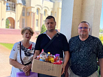 Семьи беженцев с Донбасса получили гуманитарную помощь